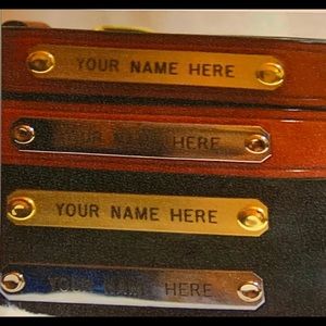 Leather belts with brass name tag
